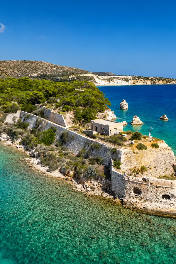 Turquoise bay and sandy Mediterranean beach along the coastline of Souda Island in Crete